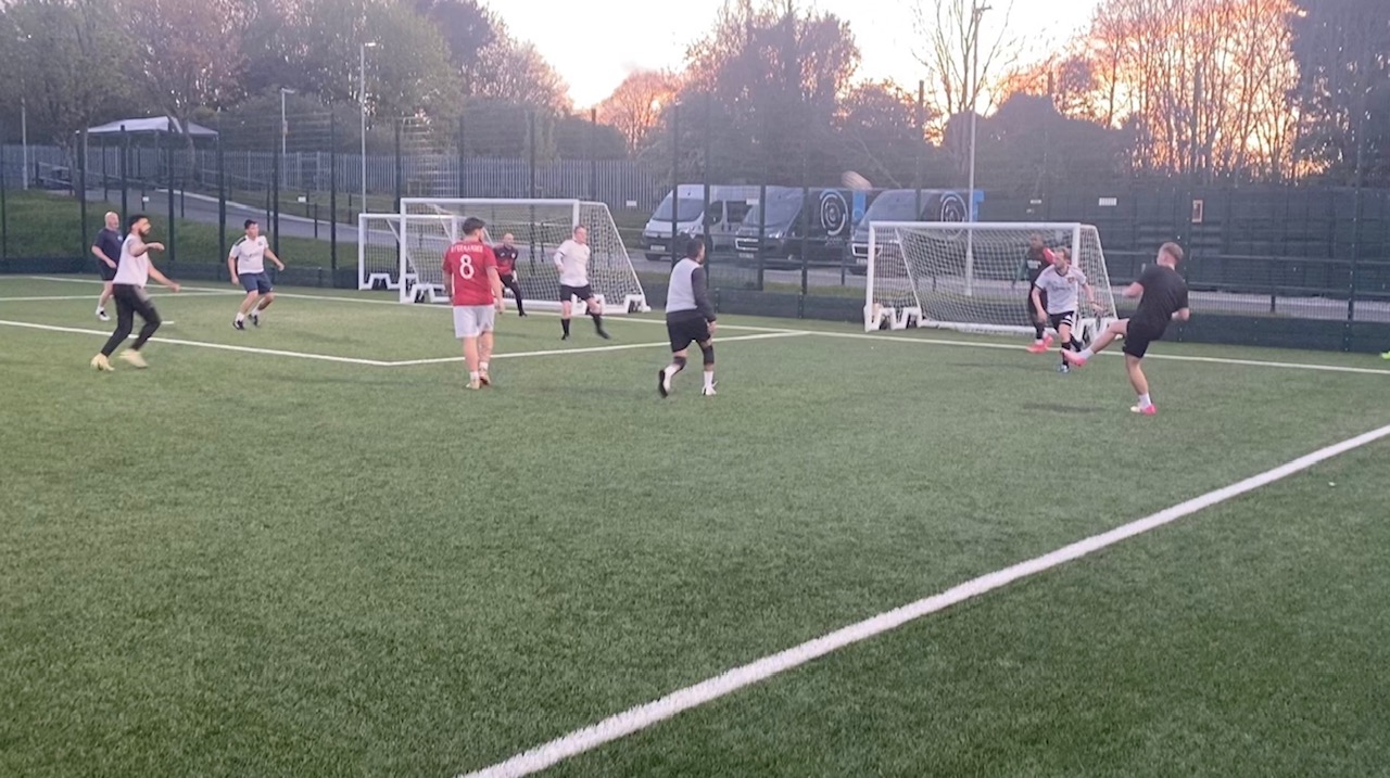 Players on the 3G pitch under floodlights at a Thursday Night Football session.